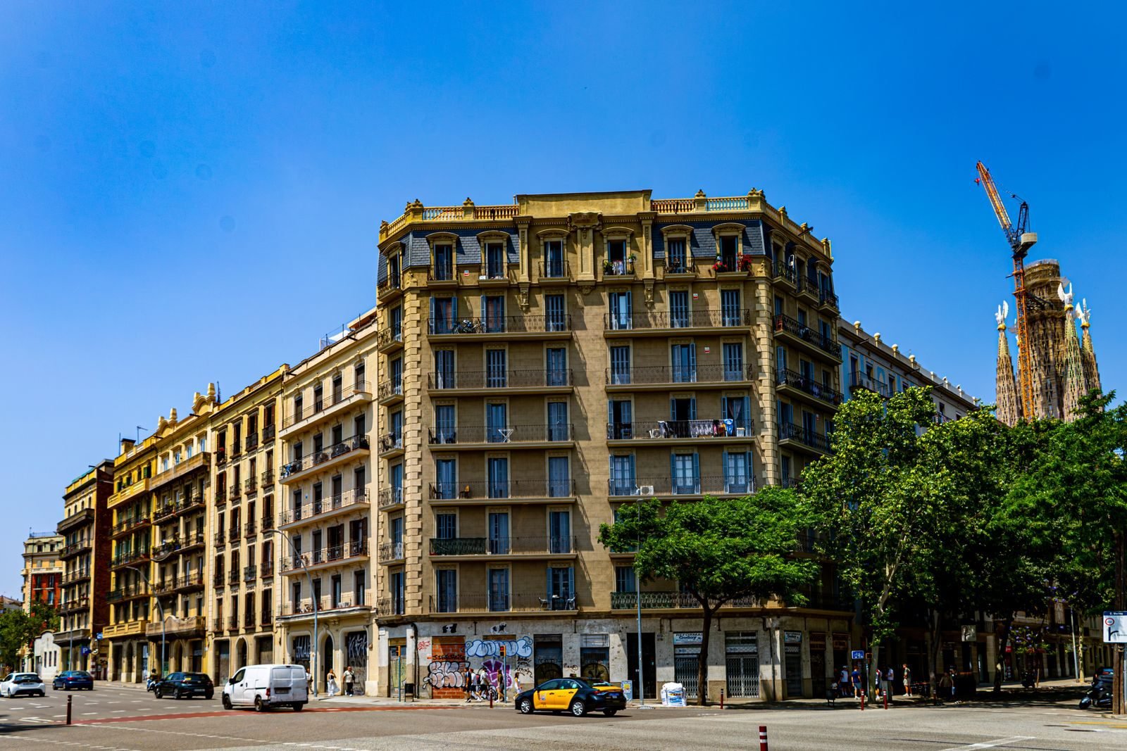 Classic Barcelona buildings under a blue sky