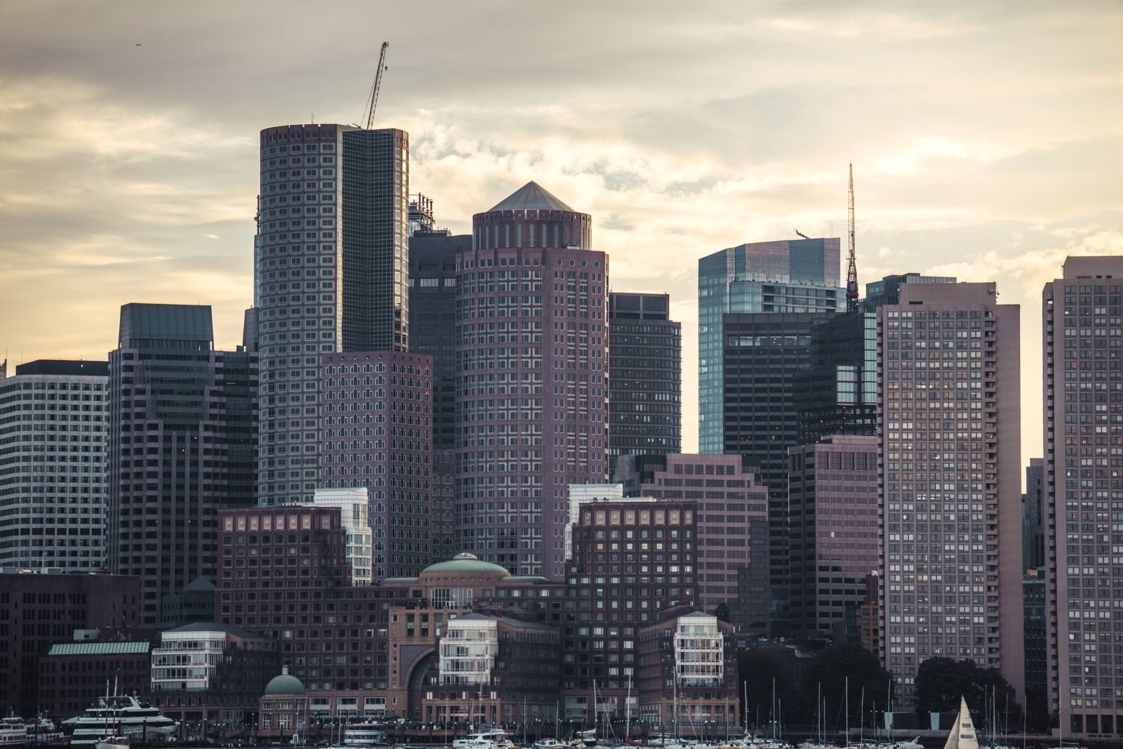 Boston skyscrapers at dusk, host of the marathon with a 5:17 Boston Marathon cutoff in 2027