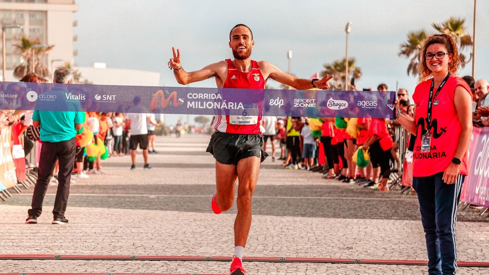 Runner celebrating at the finish after a negative split