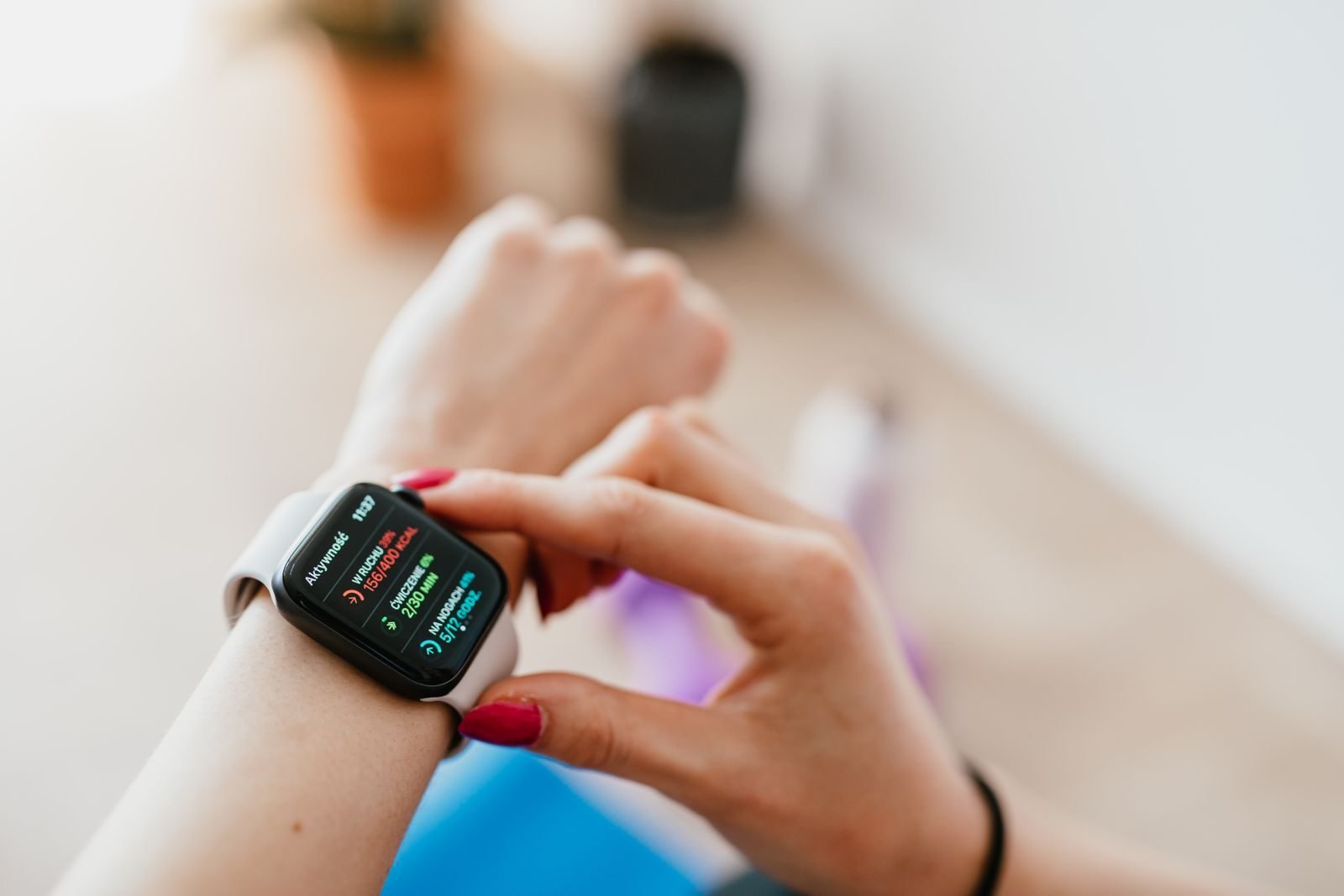 Woman checking the data on her sports watch