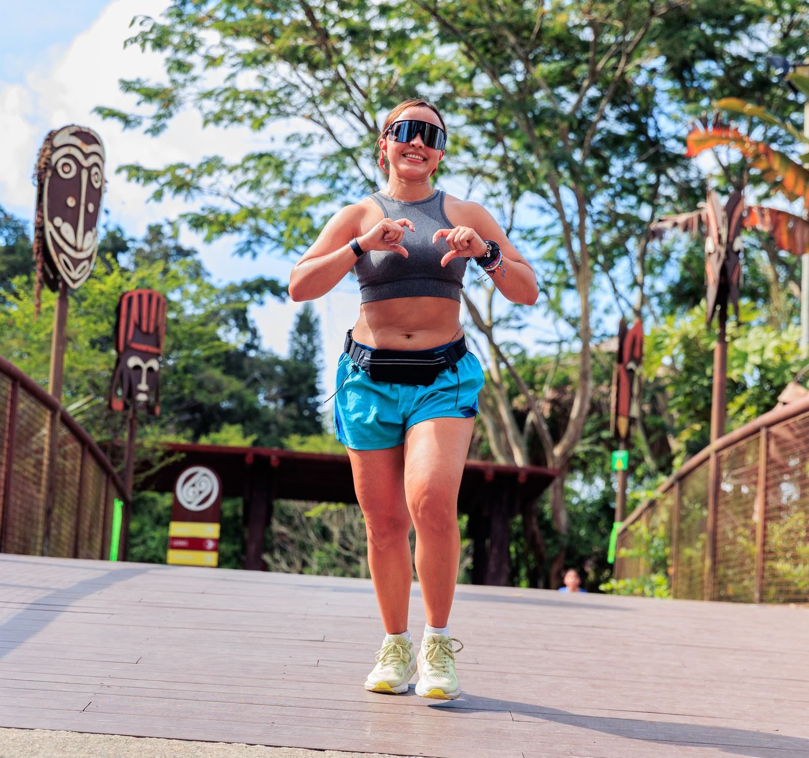 Woman jogging in a park, gifts for female runners