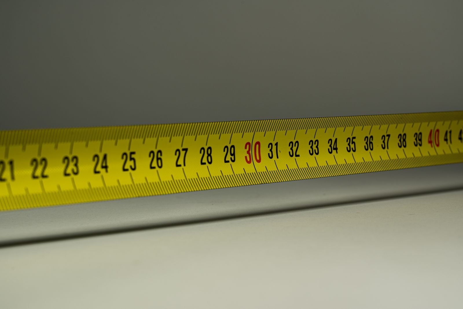 Tape measure in centimeters to measure your foot and find your running shoe size
