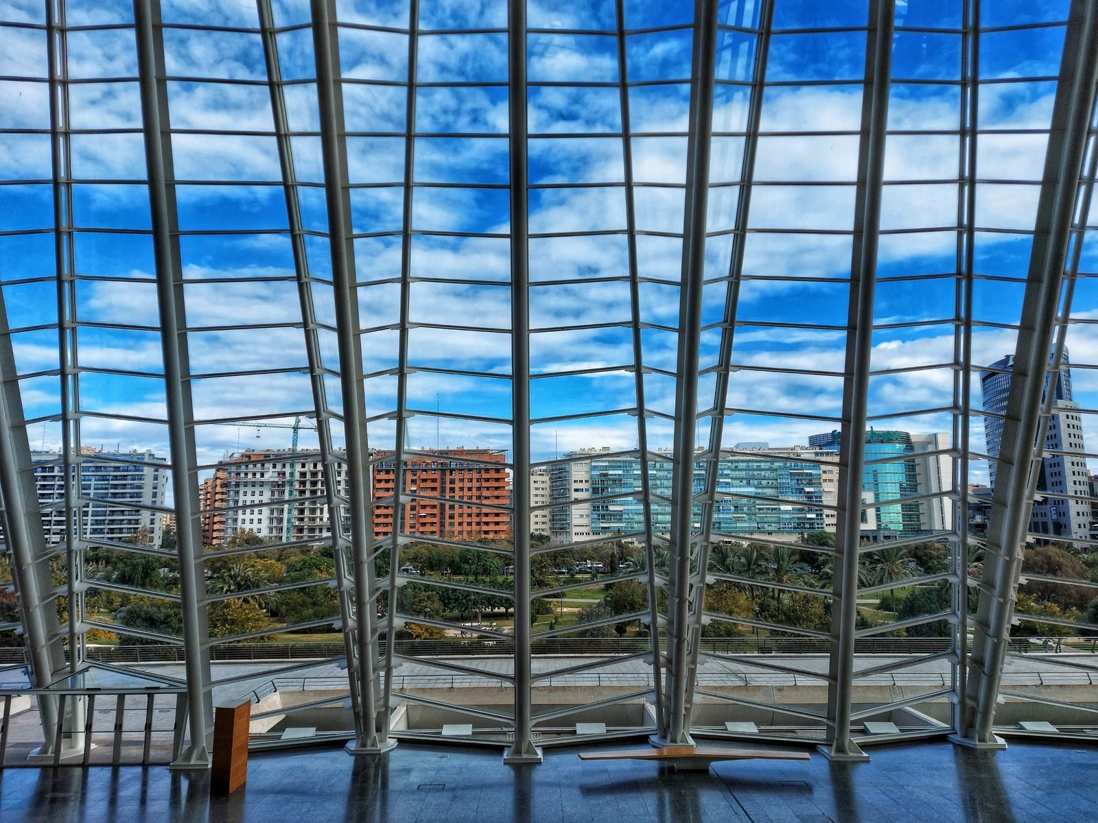 Inside a modern Valencia landmark with the city behind