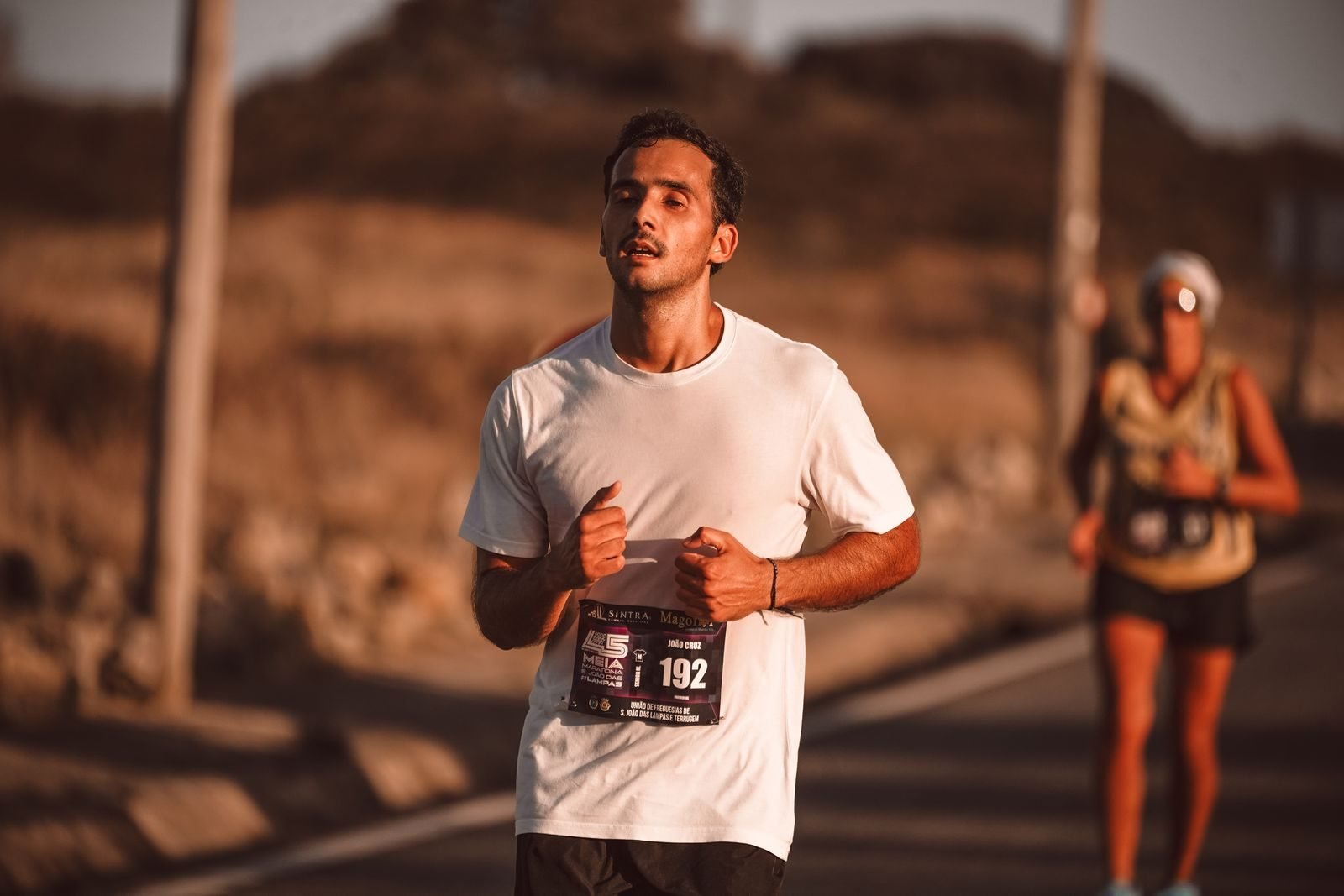 Focused runner in a city race like the Barcelona Half Marathon