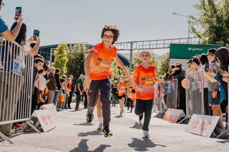 Children running a city race, running gifts for kids
