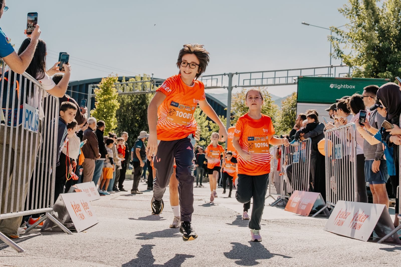 Children running a city race, running gifts for kids