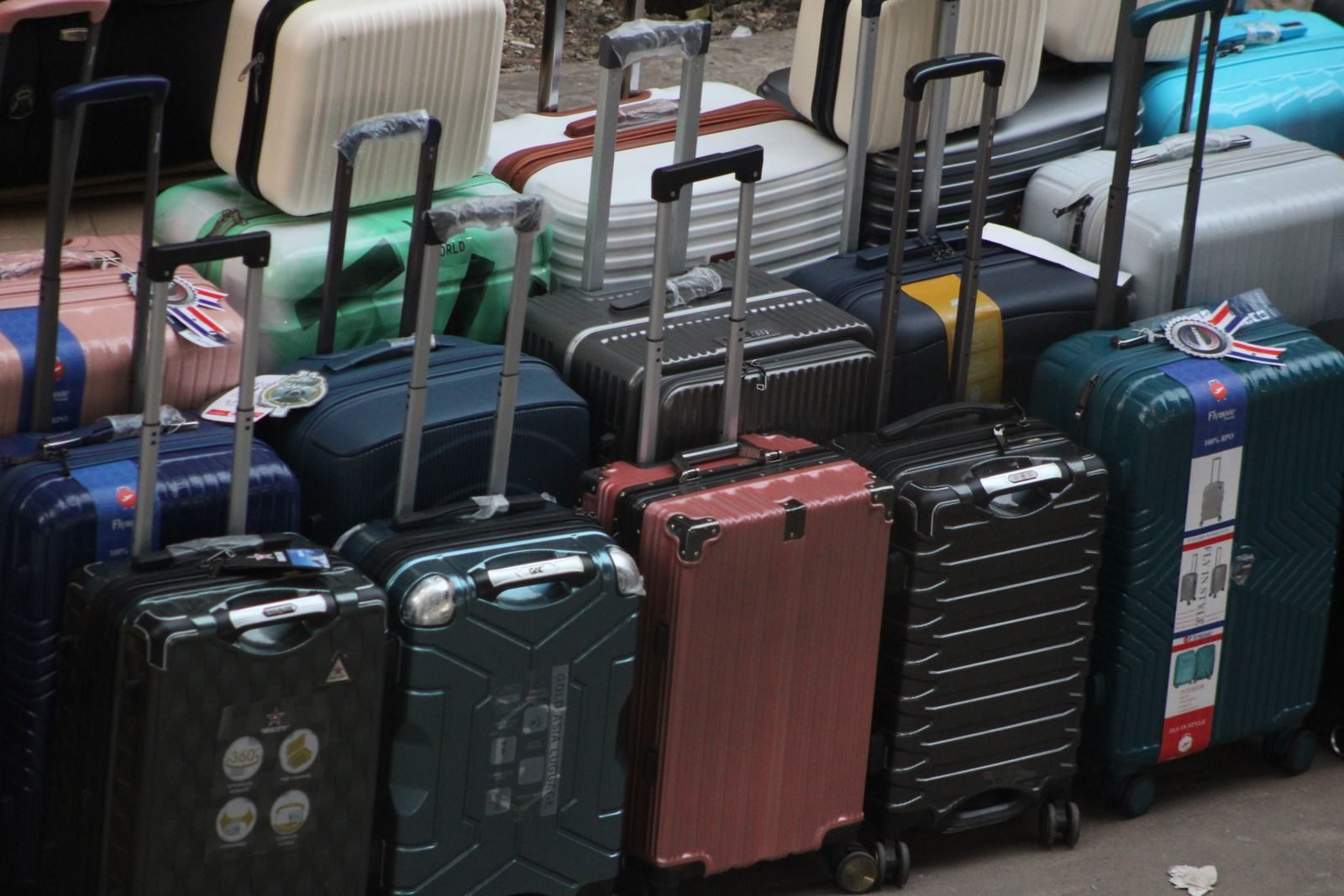 Several modern suitcases ready for a trip