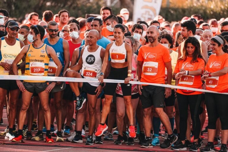 Runners at the start line of a race after tapering